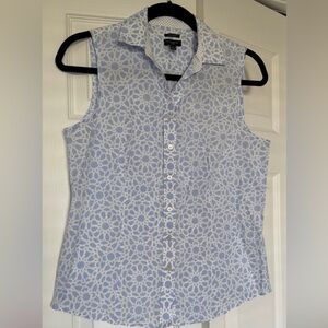 Talbots sleeveless blouse. Light blue button front.